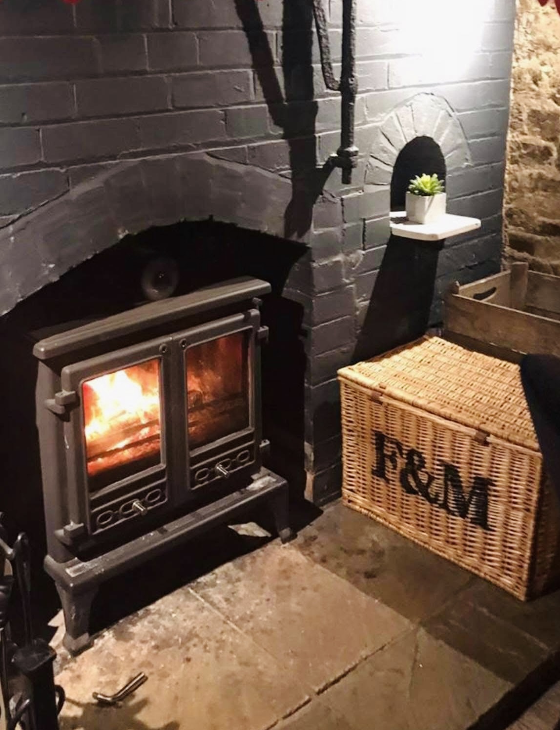 Fireplace with F&M wicker hamper