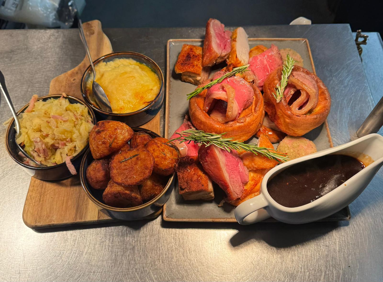 Sunday roast platter with beef, pork belly, Yorkshires and trimmings